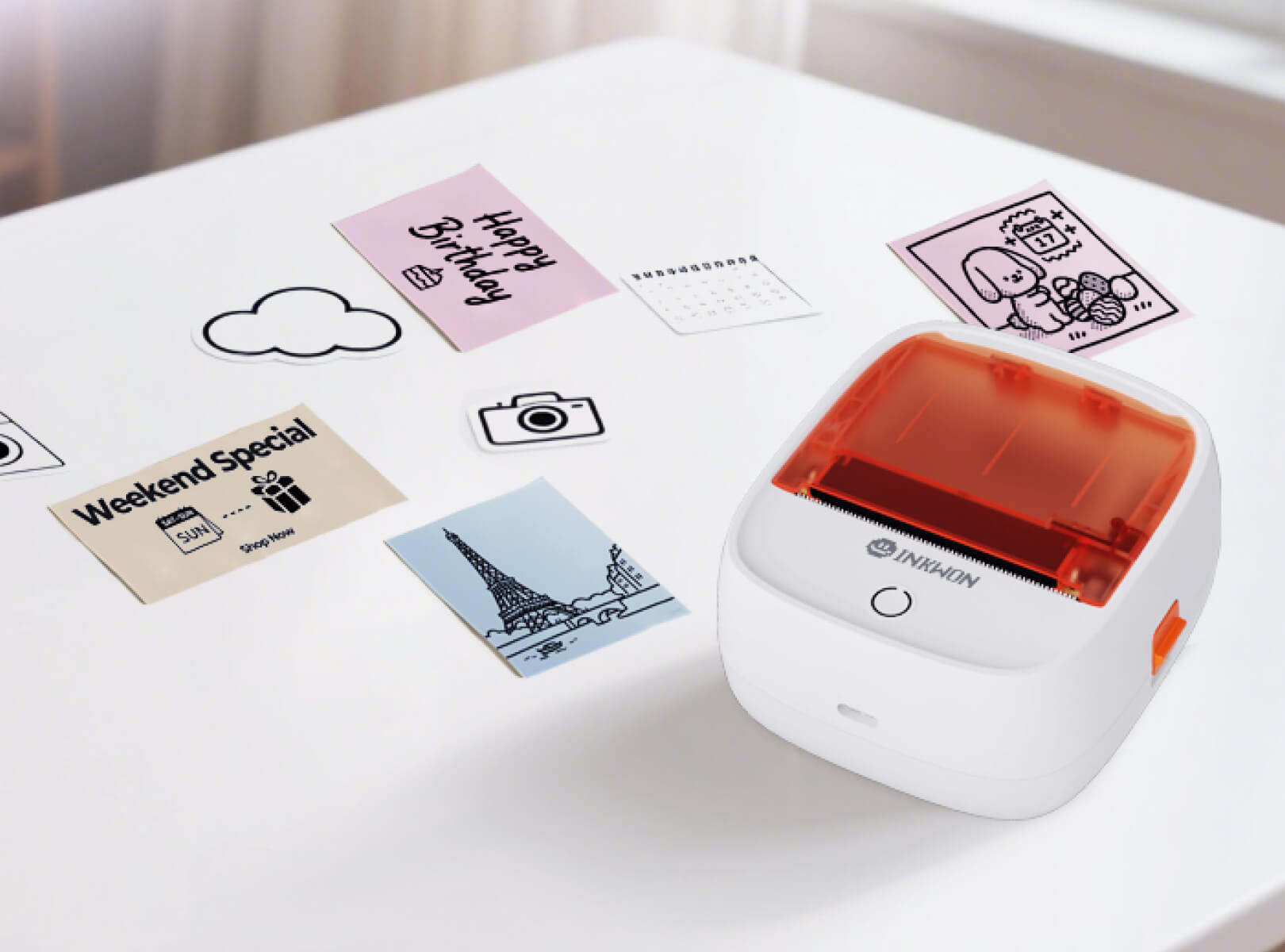 Inkwon label printers on the table with visuals that it print out